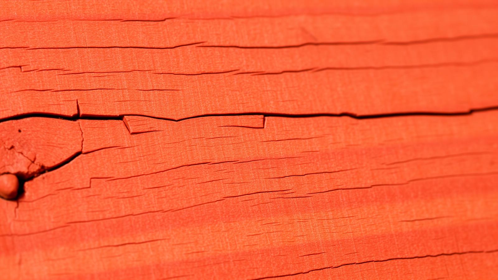 Close-up of Western Red Cedar wood grain texture showing natural color variation